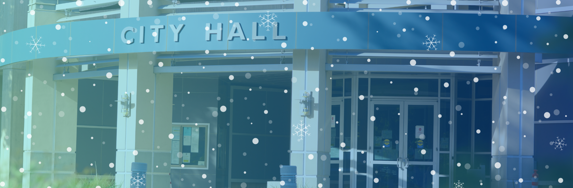 front of Ontario City Hall Building with blue transparent overlay, snow, and snowflakes